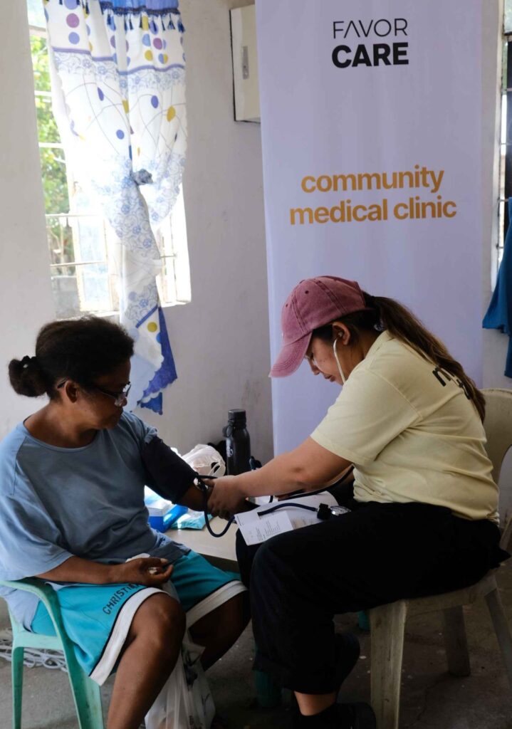 A Favor Care outreach beneficiary smiling